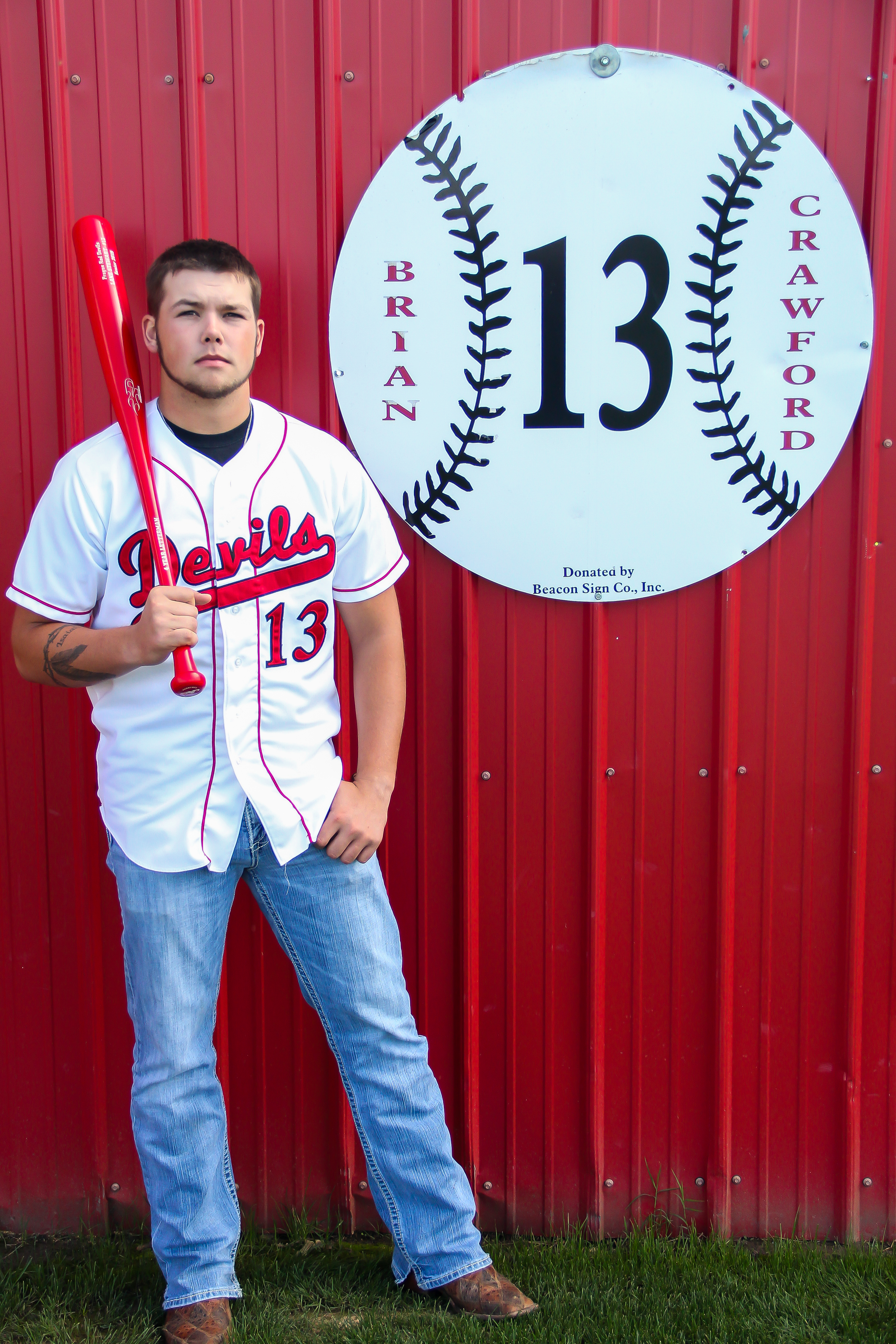 Lane Stewart, 2015 Brian Crawford Memorial Scholarship recipient, at the Prague High School baseball field