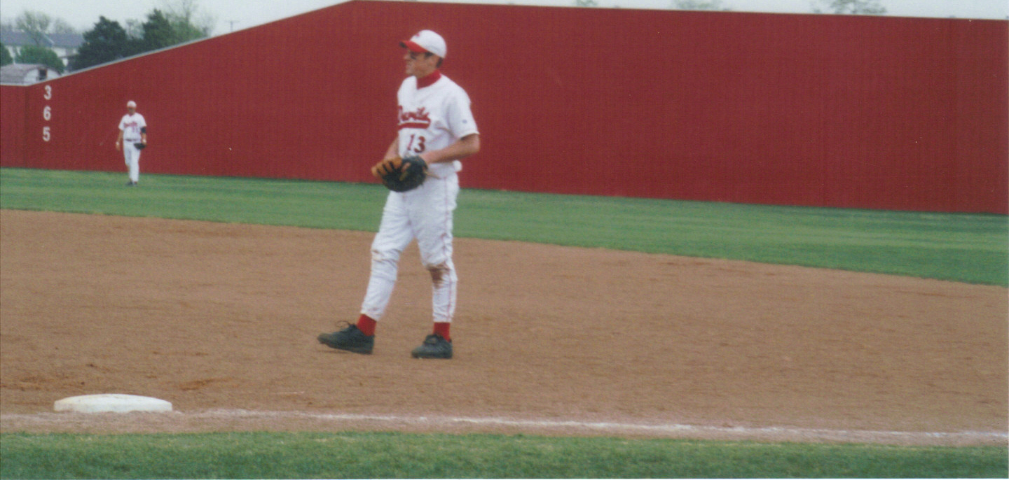 Brian Crawford playing first base for Prague High School on April 18, 2005