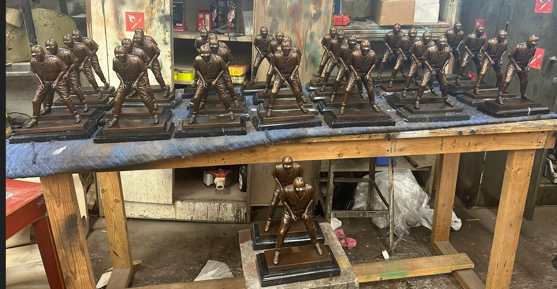 Brian Crawford Memorial miniature bronze scholarship statues